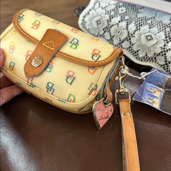 Dooney & Bourke Handbags - Dooney & Bourke Vintage Multicolor Monogram Wristlet With Pink Heart Charm